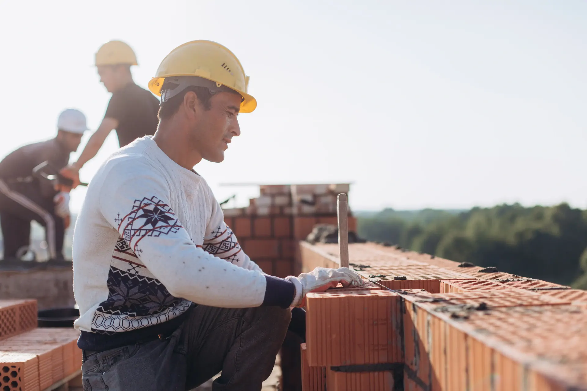 Legacy Mason Contractors crew laying brick on a Fairfield County, CT job site
